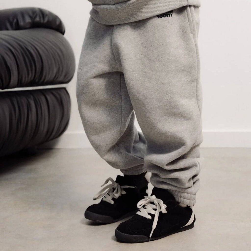 Pantalon de jogging en coton molletonné chiné gris moyen avec logo imprimé, taille et chevilles élastiquées pour enfants de 2 à 14 ans