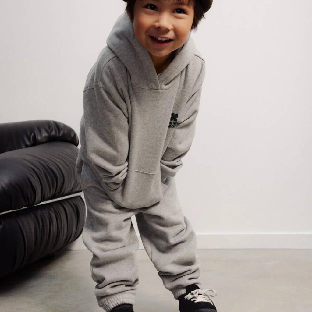 Pantalon de jogging en coton molletonné chiné gris moyen avec logo imprimé, taille et chevilles élastiquées pour enfants de 2 à 14 ans
