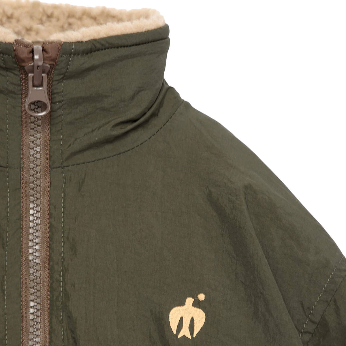 Veste réversible en polyester recyclé uni marron Sporty Otter avec deux options de style pour les enfants de 1 à 13 ans
