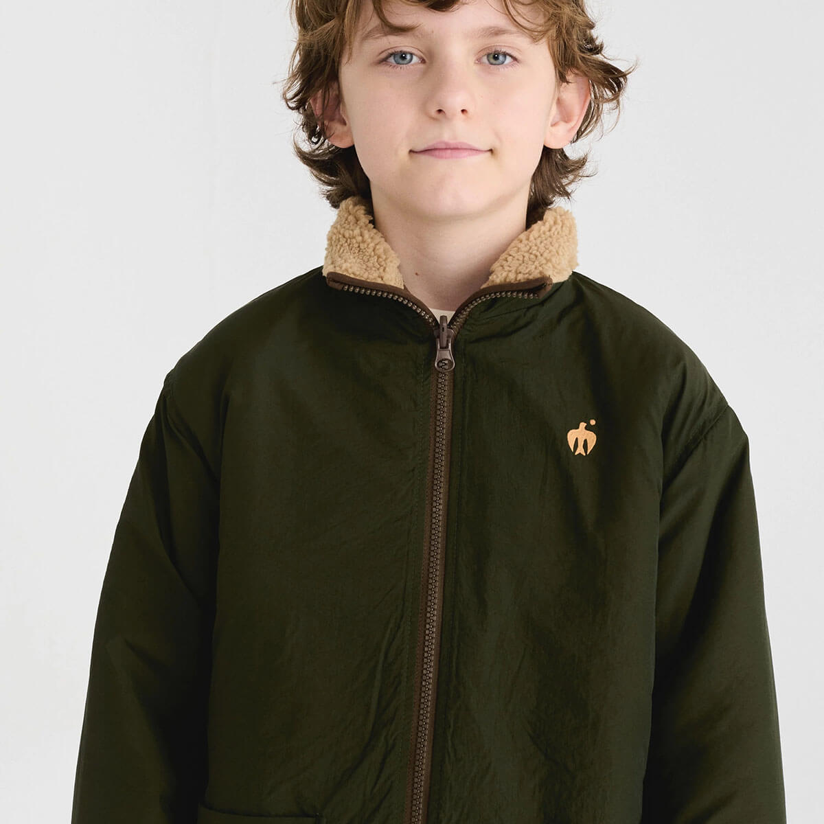 Veste réversible en polyester recyclé uni marron Sporty Otter avec deux options de style pour les enfants de 1 à 13 ans