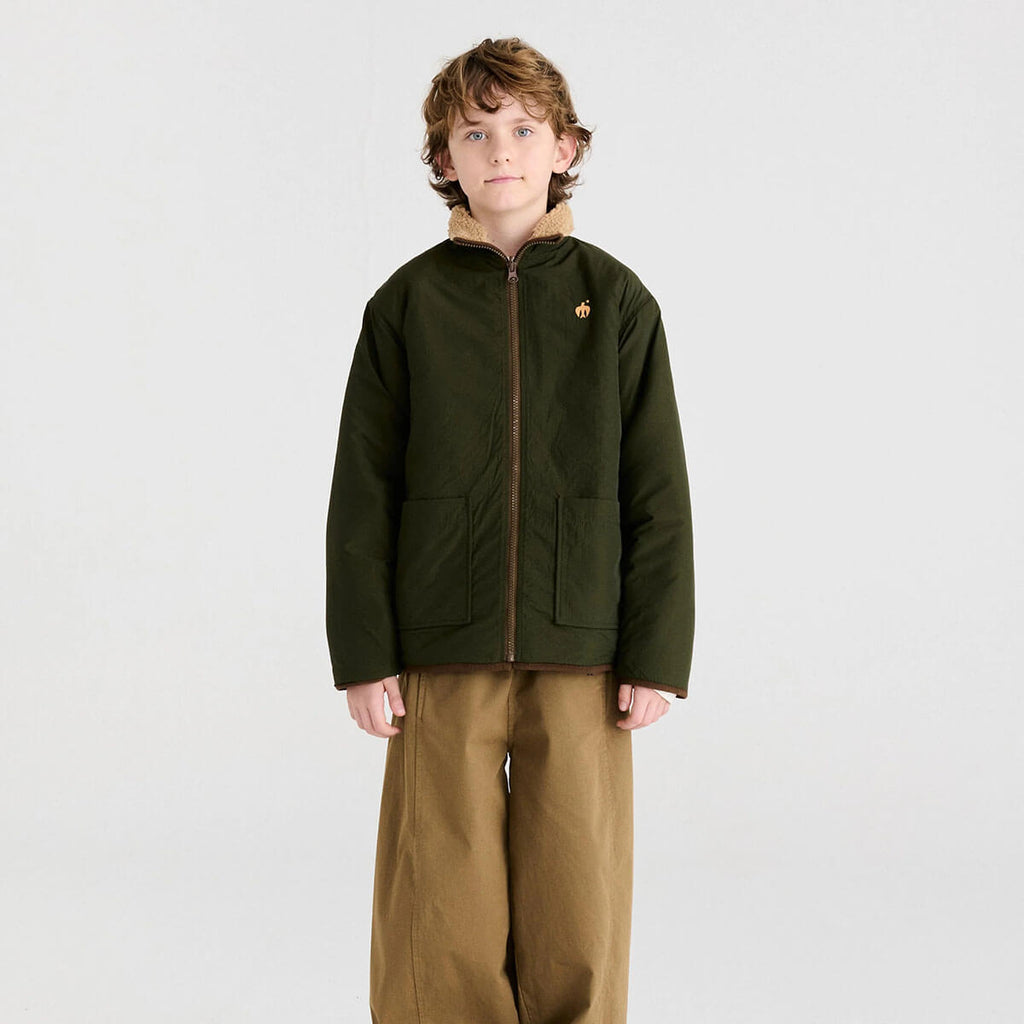 Veste réversible en polyester recyclé uni marron Sporty Otter avec deux options de style pour les enfants de 1 à 13 ans