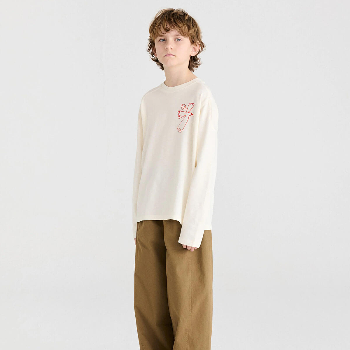 T-shirt décontracté en coton biologique blanc cassé à imprimé graphique avec col rond et épaules tombantes pour enfants de 1 à 13 ans