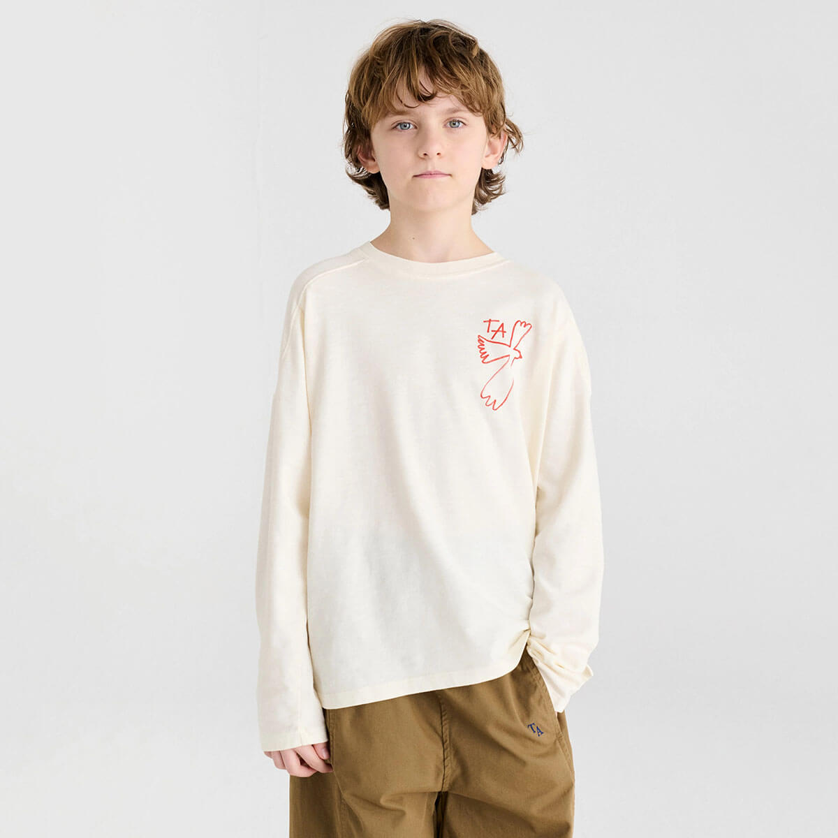 T-shirt décontracté en coton biologique blanc cassé à imprimé graphique avec col rond et épaules tombantes pour enfants de 1 à 13 ans