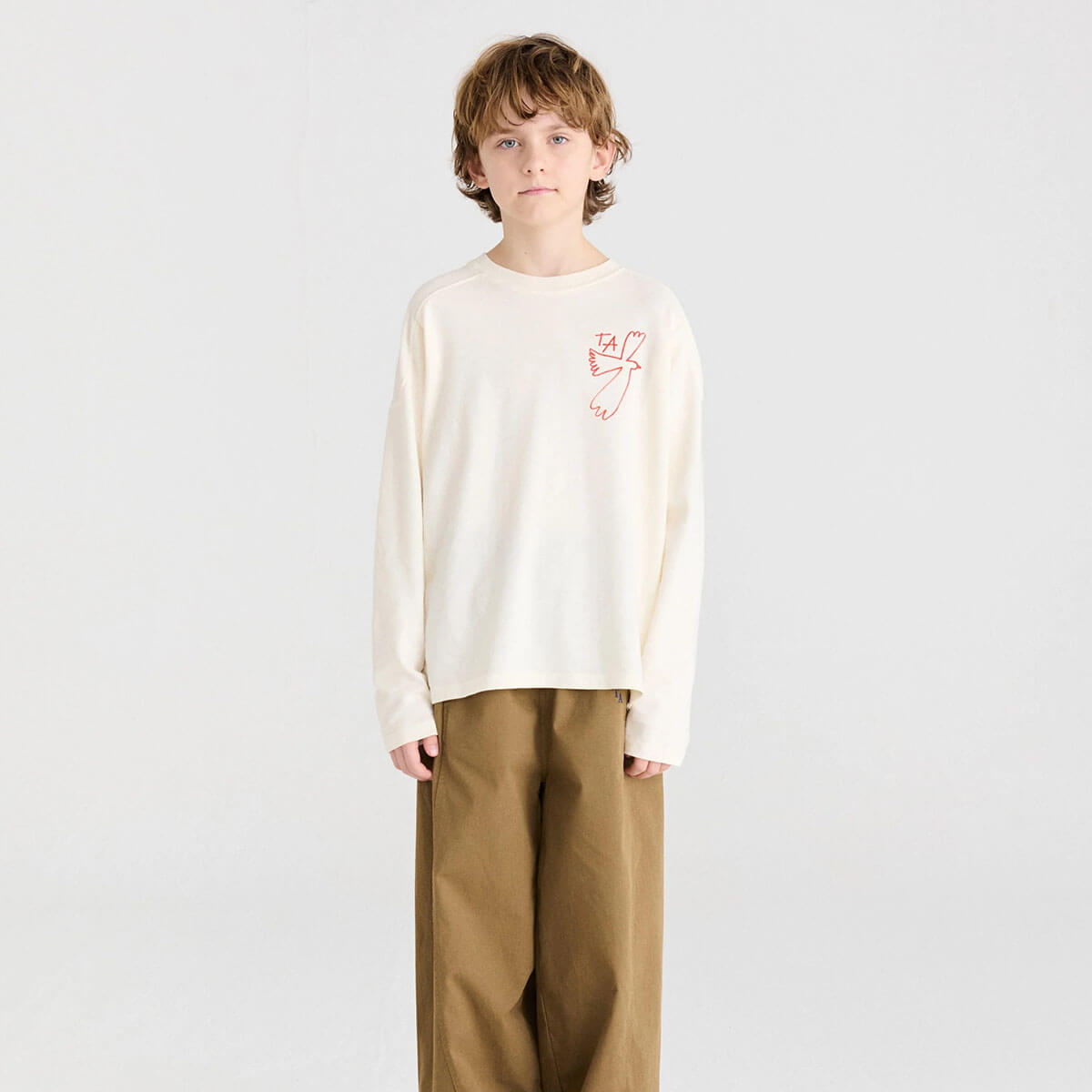 T-shirt décontracté en coton biologique blanc cassé à imprimé graphique avec col rond et épaules tombantes pour enfants de 1 à 13 ans