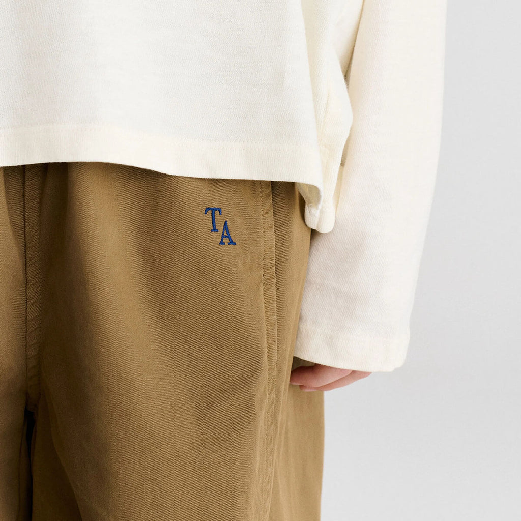 Pantalon décontracté en coton biologique à jambe droite marron loutre, avec taille élastique pour enfants de 1 à 13 ans